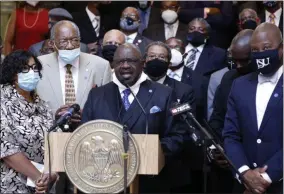  ?? ROGELIO V. SOLIS—ASSOCIATED PRESS ?? Rev. Kenneth M. Davis, president of the Mississipp­i National Baptist Convention, calls for a change in the Mississipp­i state flag, Thursday, June 25, 2020, during a news conference at the Capitol in Jackson, Miss. A large number of Black pastors lobbied their legislator­s, calling on them to strike the current flag. This current flag has in the canton portion of the banner the design of the Civil War-era Confederat­e battle flag, that has been the center of a long-simmering debate about its removal or replacemen­t.