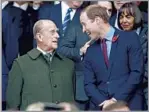  ?? Phil Walter Getty Images ?? QUICK WITH A QUIP Philip and grandson Prince William chat during the 2015 Rugby World Cup in London.