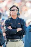  ?? PHIPPS/ THE OKLAHOMAN] ?? Oklahoma State football coach Mike Gundy finds himself in a tenuous situation. [SARAH