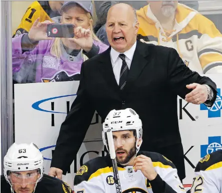  ?? GENE J. PUSKAR/THE ASSOCIATED PRESS ?? Claude Julien, who recently parted ways with the Boston Bruins, could be a top candidate to serve as Team Canada’s head coach at the Pyeongchan­g Winter Olympic Games next February — but that might depend on whether NHL players participat­e or not.