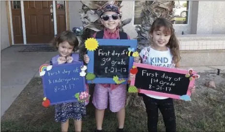  ?? PHOTO COURTESY OF JOHN LOVECCHIO ?? Mickey, Cori and Victoria Lizarraga’s first day of school.