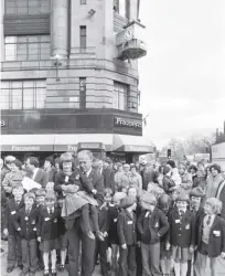  ??  ?? The clock is dismantled before being taken to the workshop; top right, Johnnie Walker is currently refurbishi­ng the building; bottom right, the clock is switched in 1980