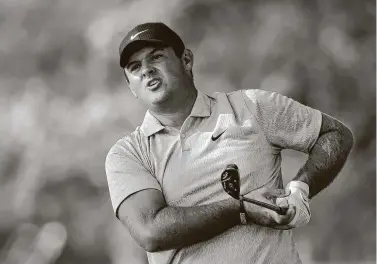  ?? Jamie Squire / Getty Images ?? The Woodlands’ Patrick Reed watches his tee shot on No. 18 during the second round at Winged Foot in Mamaroneck, N.Y. Reed shot even-par 70 and is currently 4-under, one shot ahead of Bryson DeChambeau.