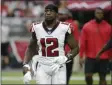  ?? RICK SCUTERI - THE ASSOCIATED PRESS ?? FILE - In this Oct. 13, 2019 file photo, Atlanta Falcons wide receiver Mohamed Sanu pauses (12) during an NFL football game against the Arizona Cardinals in Glendale, Ariz. A person within the NFL says the Atlanta Falcons have traded Sanu to the New England Patriots for a second-round draft pick in 2020.