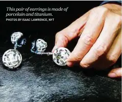  ?? Photos by Isaac Lawrence, nyt ?? This pair of earrings is made of porcelain and titanium.