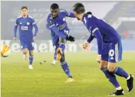  ??  ?? SMASHED IT Iheanacho scores his second goal for Leicester