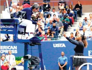  ?? AFP ?? Serena Williams argues with chair umpire Carlos Ramos while playing Naomi Osaka in the 2018 US Open final on Saturday in New York.