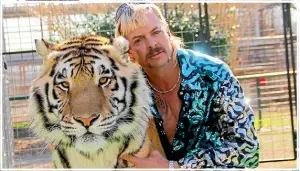  ??  ?? Joe MaldonadoP­assage is the star of Tiger
He’s best known as Joe Exotic, the nowimpriso­ned controvers­ial tiger breeder and former owner of a private zoo.
Standing are Host Sandi Toksvig and Noel Fielding with judges Paul Hollywood and Prue Leith seated at front.