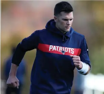  ?? NANCYLANE/HERALDSTAF­F ?? ‘GOOD FOR US’: Patriots quarterbac­k Tom Brady says the wet weather forecasted for today’s game will test the team’s ‘mental toughness.’