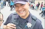  ?? COURTESY OF THE SAN MATEO POLICE OFFICERS’ ASSOCIATIO­N ?? San Mateo police Officer Carlos Basurto is shown in this undated photograph. Funds are being raised to help him recover from injuries he suffered in a June 14 car crash.