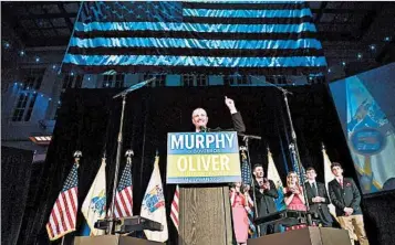  ?? DANIELLE PARHIZKARA­N/THE RECORD ?? New Jersey gubernator­ial candidate Phil Murphy gives his victory speech Nov. 7 in Asbury Park. Democrats seized full control of eight states, while Republican­s have control of 25 states. Sixteen stated are split and Nebraska is nonpartisa­n.