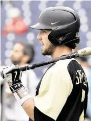  ?? Mike Theiler / Associated Press ?? Vanderbilt shortstop Dansby Swanson, the top pick in the draft, is 1-for-13 with five K’s in the CWS.