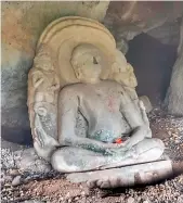  ??  ?? The statue of Jain Tirthankar­a found inside a cave on Aggalaiah Gutta in Hanamkonda.