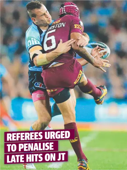  ??  ?? CRUNCH TIME: Josh Reynolds hammers Johnathan Thurston in one of their clashes at the State of Origin level.