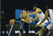  ?? CHRIS MARION — NBAE ?? Guard Jeremy Lin drives to the basket in the Santa Cruz Warriors’ loss to Lakeland in the NBA G League semifinals in the Orlando bubble on Tuesday night.