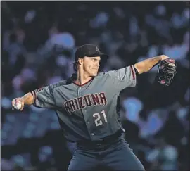  ?? Jae C. Hong Associated Press ?? DIAMONDBAC­KS STARTER Zack Greinke gave up three runs and seven hits in 61⁄3 innings against the Angels, striking out five and walking two.