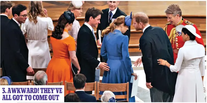  ?? ?? 3. AWKWARD! THEY’VE ALL GOT TO COME OUT
Making way: The early arrivals, including Princesses Eugenie, left, and Beatrice and their husbands, stand up to make way for the duke and duchess