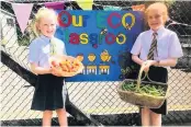  ??  ?? Produce grown at St Mary’s RC primary school was donated to the local foodbank