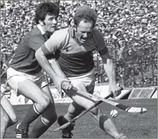  ??  ?? Wexford’s Tony Doran is challenged by Cork’s Brian Murphy during the 1976 All-Ireland hurling final at Croke Park.