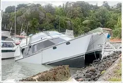  ?? JEROEN JONGEJANS ?? At least 50 boats are damaged or entirely written off after being hit by the impact of the Tonga tsunami.