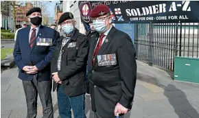  ?? GETTY IMAGES ?? Veterans and supporters stand outside Belfast’s Laganside Courts as the trial begins of two former British paratroope­rs charged with the murder of Official IRA man Joe McCann.