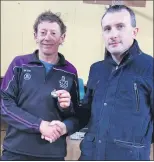  ?? ?? Willie O’Donoghue, individual gold medallist at the county masters in Clerihan last Sunday, being presented with his medal by Owen Fanning, county chairman.