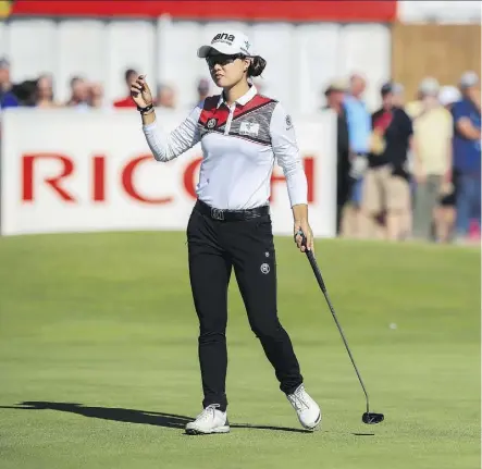  ?? PETER BYRNE/PA VIA THE ASSOCIATED PRESS ?? Australia’s Minjee Lee had the first-round lead at the Women’s British Open Thursday in Lytham St Annes, England, firing a 7-under 65 to take a one-shot lead into Friday.