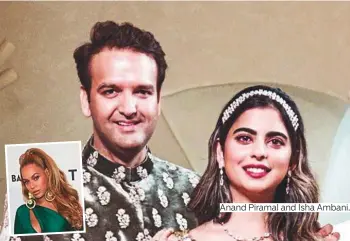  ?? Photos by AP ?? Anand Piramal and Isha Ambani.