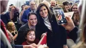  ?? MICHAEL DWYER / AP ?? Republican presidenti­al candidate Nikki Haley poses for a selfie after speaking at a campaign event in South Burlington, Vermont, on Sunday.