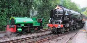  ?? JIMMY JAMES ?? Little ‘n’ large at Bodmin Parkway, as one of the smallest standard gauge locomotive­s in preservati­on - Port of Par Bagnall 0-4-0ST Judy stands alongside the biggest engine to visit the BWR, ‘A1’ No. 60163 Tornado.