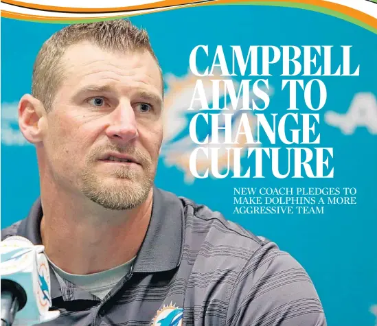  ?? SUSAN STOCKER/STAFF PHOTOGRAPH­ER ?? Dan Campbell speaks to the media Monday about being named interim coach after Dolphins owner Steve Ross fired Joe
Philbin after a disappoint­ing 1-3 start to the season.