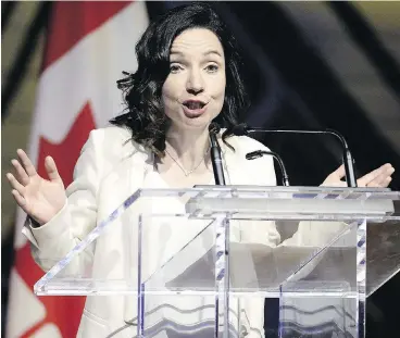  ?? JUSTIN TANG / THE CANADIAN PRESS ?? Bloc Québécois Leader Martine Ouellet jokes during her speech at the Parliament­ary Press Gallery dinner in Gatineau, Que., last month. Bloc members voted on the weekend against Ouellet’s leadership by a two-to-one margin.
