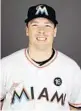  ?? DAVID J. PHILLIP/AP ?? Justin Bour is projected to bat fifth, to protect Giancarlo Stanton in the lineup.