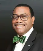  ??  ?? Akinwumi Adesina, president of the African Developmen­t Bank, is the son of a Nigerian farm labourer, who rose out of poverty. — AP