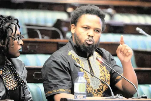  ?? | AYANDA NDAMANE African News Agency (ANA) ?? BLACK First Land First has been ordered to drop its election slogan ‘Land or Death’, after the Equality Court ruled it constitute­d hate speech. Left is BLF founder and president Andile Mngxitama speaking during a land expropriat­ion debate in Parliament prior to his expulsion from the EFF.