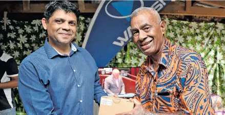  ?? Photo: DEPTFO News ?? Attorney-General Aiyaz Sayed-Khaiyum giving out set top boxes for Walesi TV to enable people to keep in touch with what’s happening in Fiji.