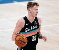  ?? Sue Ogrocki / Associated Press ?? Called up from the G League bubble, Luka Samanic earned his second career start Wednesday for the short-handed Spurs.