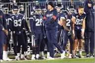  ?? Stephen Dunn / Associated Press ?? UConn coach Randy Edsall watches during the first half against Navy in 2019.