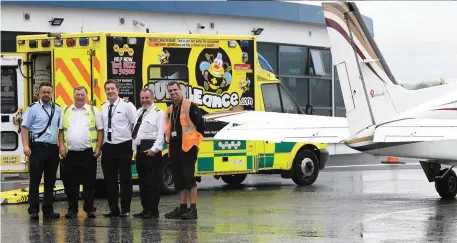  ??  ?? Pictured at Kerry Airport to help with the transfer from air to ground were Thomas O’Donnell, Kerry Airport staff; Jim Burke, BUMBLEance staff; Ryan Hanrahan, pilot; Captain Mike Drake; and Ciaran O’Mahony, Kerry Airport staff.