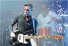  ?? SCOTT BARBOUR ?? The Killers will warm up for its headlining set at Lollapaloo­za in Chicago with a show at the Rave in Milwaukee Wednesday.