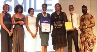  ??  ?? L-R: Social Media Consultant, Ms Isioma Nwani; Product Manager, Ms Chika Chalokwu; CRM Lead, Ms Maria Akwaje; Dental Nurse; Feyisike Adeosun; Senior Dentist and Clinic Head, Dr Latre Bakoshi; and the Dental Nurse, Daniel Adekoya receiving the award at the NHEA event in Lagos