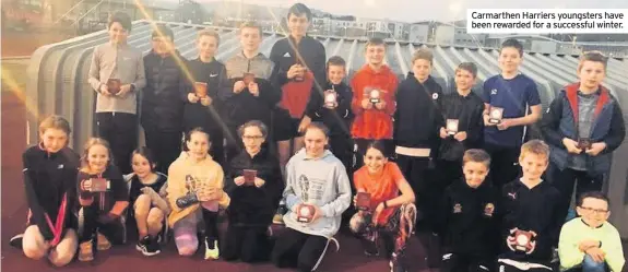  ??  ?? Carmarthen Harriers youngsters have been rewarded for a successful winter.