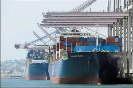  ?? THE ASSOCIATED PRESS ?? Ships are docked at the Port of Long Beach in Long Beach, Calif. Between them, the California ports of Los Angeles and Long Beach account for a large amount of the seaborne goods that the United States imports from China, and the prospect of a widening trade war between the global giants has port executives and longshorem­en worried.