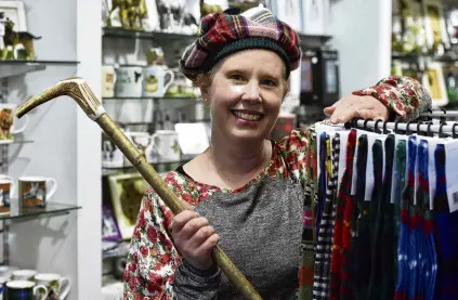  ?? ?? Hats on . . . The Scottish Shop employee Lara Findlater is happy about the move to Stuart St.