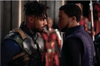 ??  ?? Michael B. Jordan (left) and Chadwick Boseman star in “Black Panther.”
