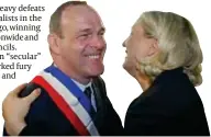  ?? PHOTO: AP ?? Le Pen with new NF mayor Steeve Briois
