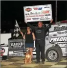  ?? SUBMITTED PHOTO - RICH KEPNER ?? Paul Kline shows off the winner’s check after taking the top prize in the Sportsman Summer Splash Saturday night at Grandview.