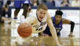  ?? MATT SLOCUM — THE ASSOCIATED PRESS ?? Villanova’s Donte DiVincenzo, here in typical form in a game against Creighton Feb. 25, wants to know what the NBA scouts think of him.