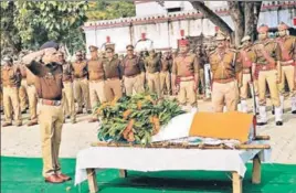  ?? PTI ?? ■ Police officials pay tribute to inspector Subodh Kumar Singh in Etah on Tuesday. &gt;&gt;P11