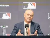  ?? LM OTERO/AP ?? MLB Commission­er Rob Manfred speaks during a news conference Thursday after owners locked out players following the expiration of the sport’s CBA.